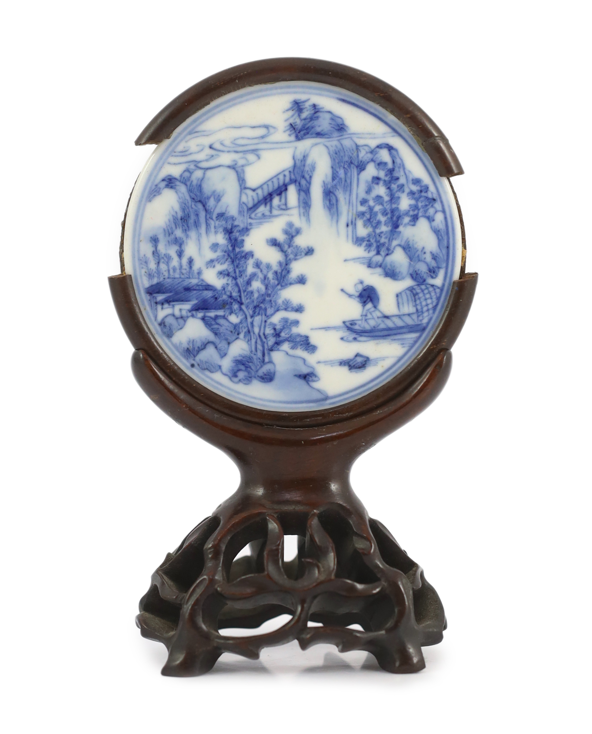 A Chinese blue and white porcelain circular plaque, possibly 17th century